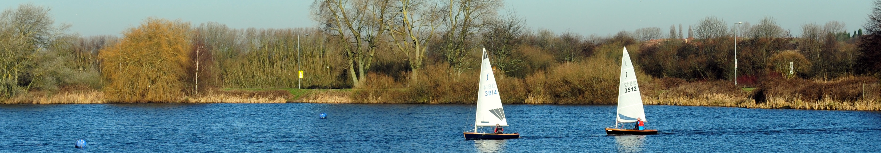 Photo of boats sailing on a lake at Aldridge Sailing Club